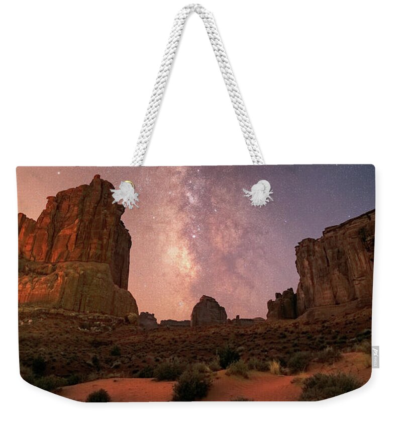 Night Weekender Tote Bag featuring the photograph Courthouse Towers and the Milky Way by Dan Norris