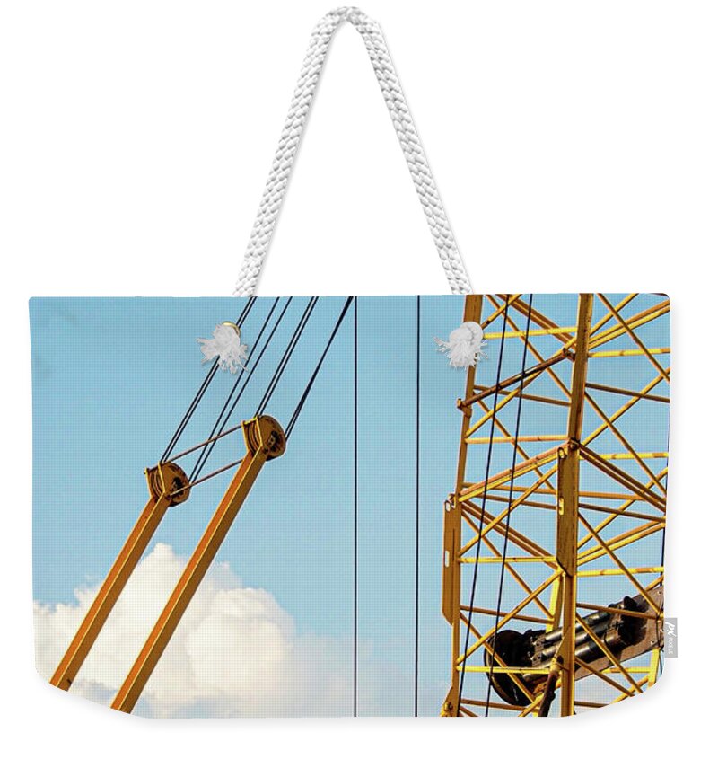 Crane Construction Metal Yellow Weekender Tote Bag featuring the photograph Crane by John Linnemeyer