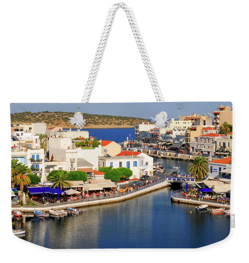 Greece Weekender Tote Bag featuring the photograph Crete island, Greece, Agios Nicolaos town by Severija Kirilovaite