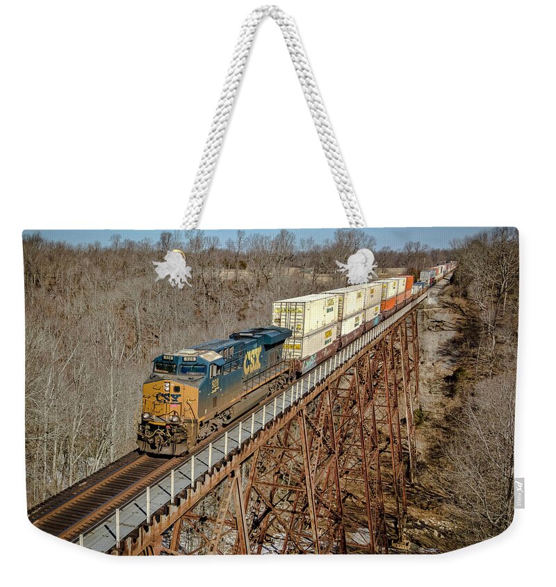 Railroad Weekender Tote Bag featuring the photograph CSX hot intermodal rolls south across Gum Lick Trestle by Jim Pearson