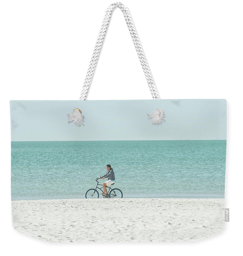 Beach Weekender Tote Bag featuring the photograph Cycling the Beach by CR Courson