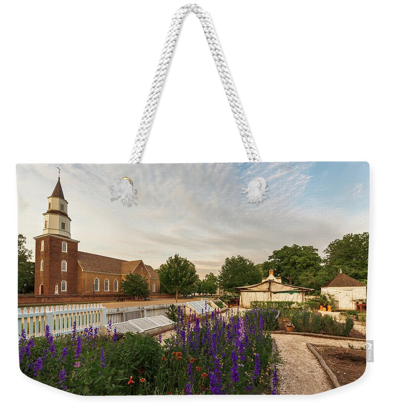 Colonial Williamsburg Weekender Tote Bag featuring the photograph Day Begins in the Spring on Duke of Gloucester Street by Rachel Morrison