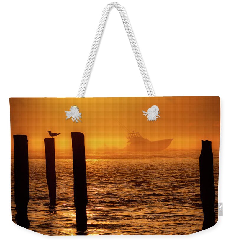 North Carolina Weekender Tote Bag featuring the photograph Deep Sea Fishing at Sunrise by Dan Carmichael