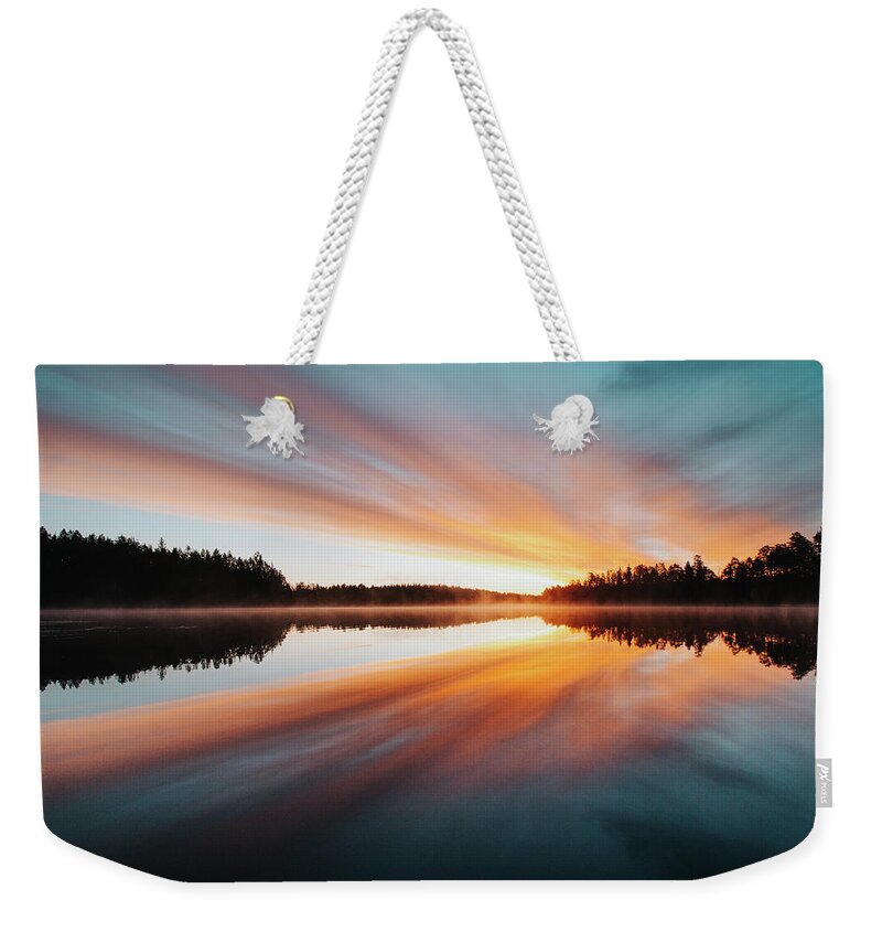 Lake Jatkonjärvi Weekender Tote Bag featuring the photograph Devil show on a Finnish lake by Vaclav Sonnek