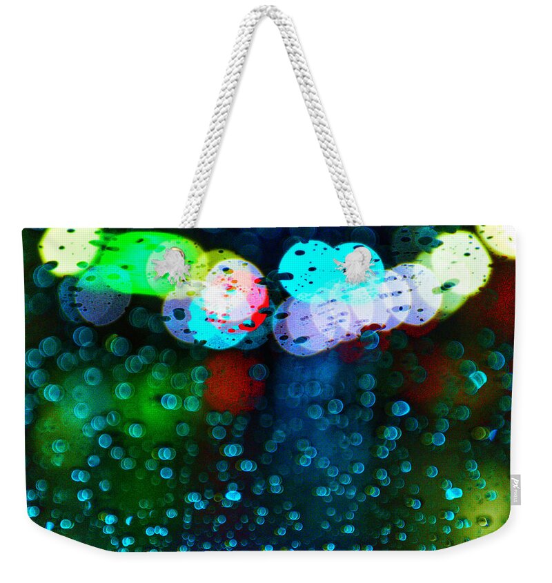 Photo Weekender Tote Bag featuring the photograph Distorted Light and Rain by Evan Foster