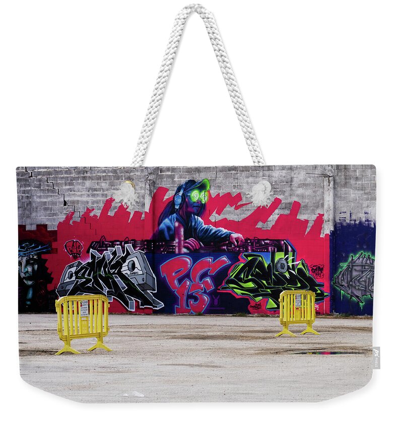 Urban Weekender Tote Bag featuring the photograph DJ Graffiti by Eric Hafner
