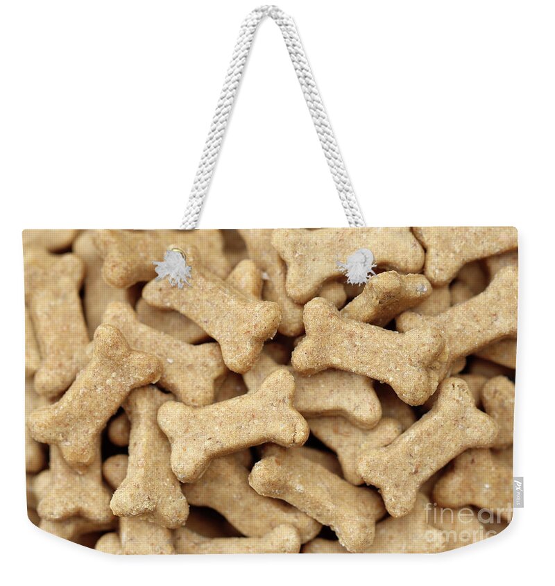 Dog Weekender Tote Bag featuring the photograph Dog Treats by Vivian Krug Cotton
