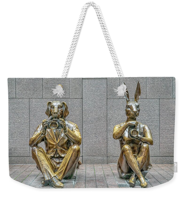 Paparazzi Dogman And Paparazzi Rabbitgirl Weekender Tote Bag featuring the photograph Dogman and Rabbitgirl by Penny Polakoff