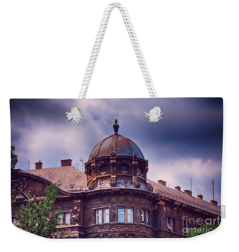 Building Weekender Tote Bag featuring the photograph Domed old building with dark blue stormy clouds by Mendelex Photography