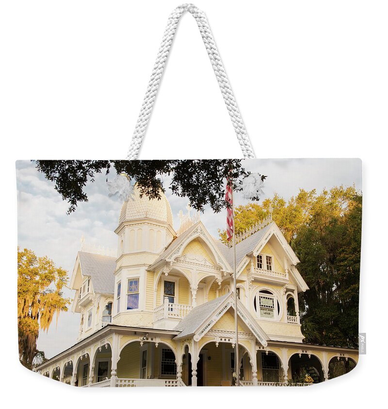 Florida Mount Dora Weekender Tote Bag featuring the photograph Donnelly House Mount Dora by Steve Williams
