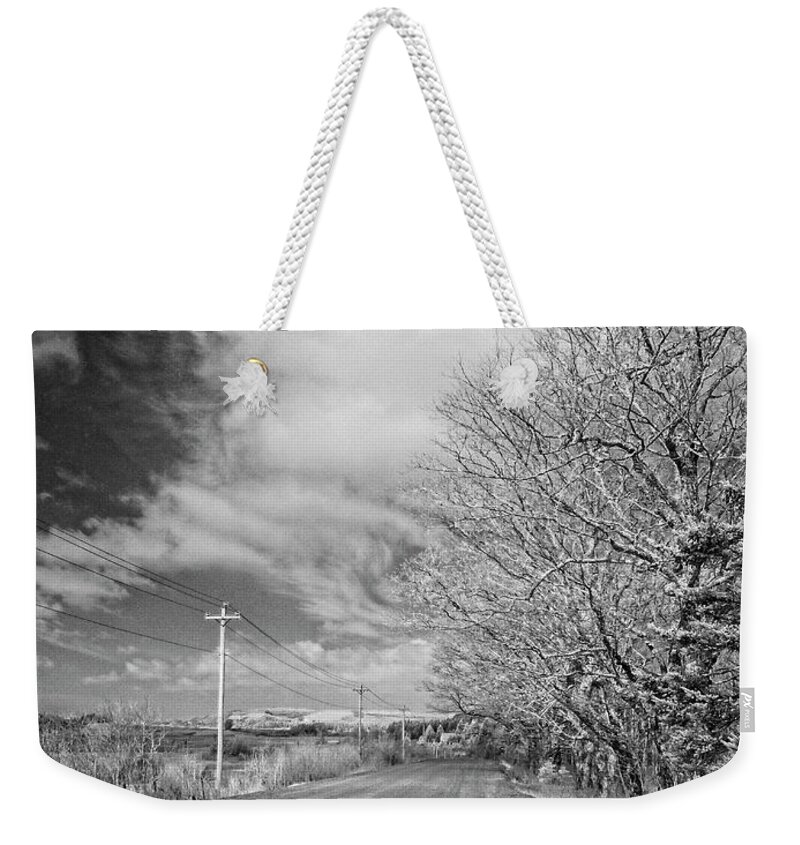 Infrared Weekender Tote Bag featuring the photograph Down the Road by Alan Norsworthy