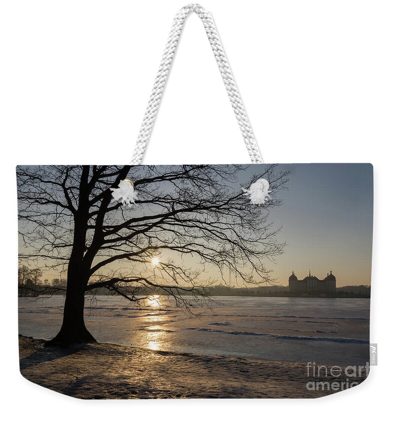 Dreamy Weekender Tote Bag featuring the photograph Winter sunset at Moritzburg Castle 1 by Adriana Mueller