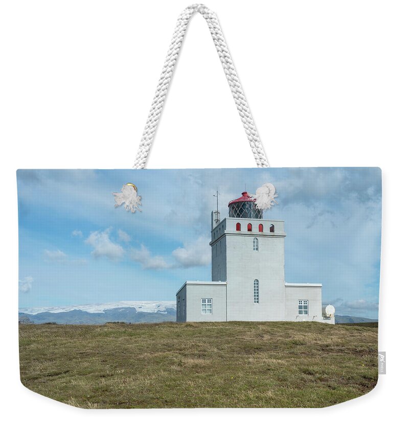 Travel Weekender Tote Bag featuring the photograph Dyrholaey Lighthouse II by Kristia Adams