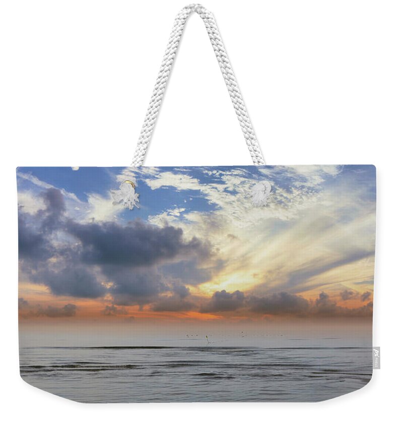 Photography Weekender Tote Bag featuring the photograph Early Spring Sky And Sea Latvia by Aleksandrs Drozdovs
