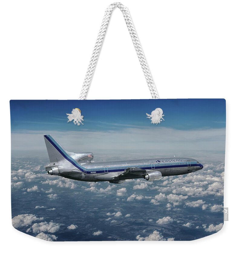 Eastern Airlines Weekender Tote Bag featuring the mixed media Eastern Airlines L-1011 TriStar by Erik Simonsen
