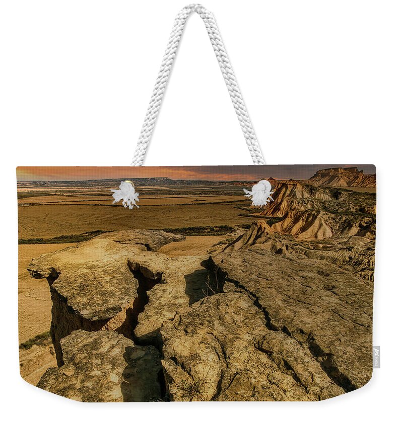 Bardenas Weekender Tote Bag featuring the photograph El Rallon plains - Bardenas Reales by Micah Offman