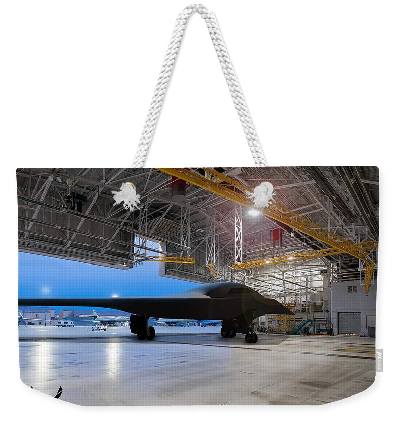 B-21 Weekender Tote Bag featuring the digital art Ellsworth AFB B-21 Raider by Custom Aviation Art