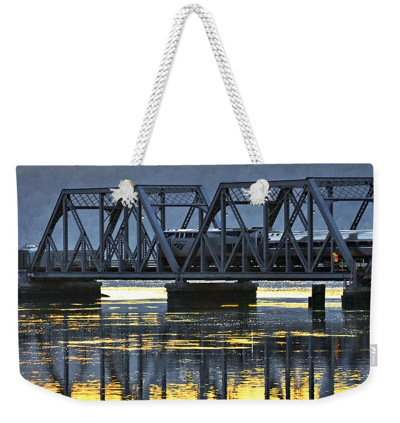 Sunset Weekender Tote Bag featuring the photograph Amtrak Empire Service on Spuyten Duyvil Bridge at Sunset by Steve Ember