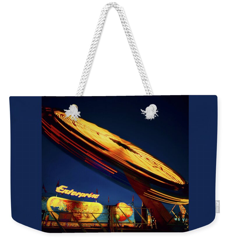 Carnival Ride Weekender Tote Bag featuring the photograph Enterprise by Don Spenner