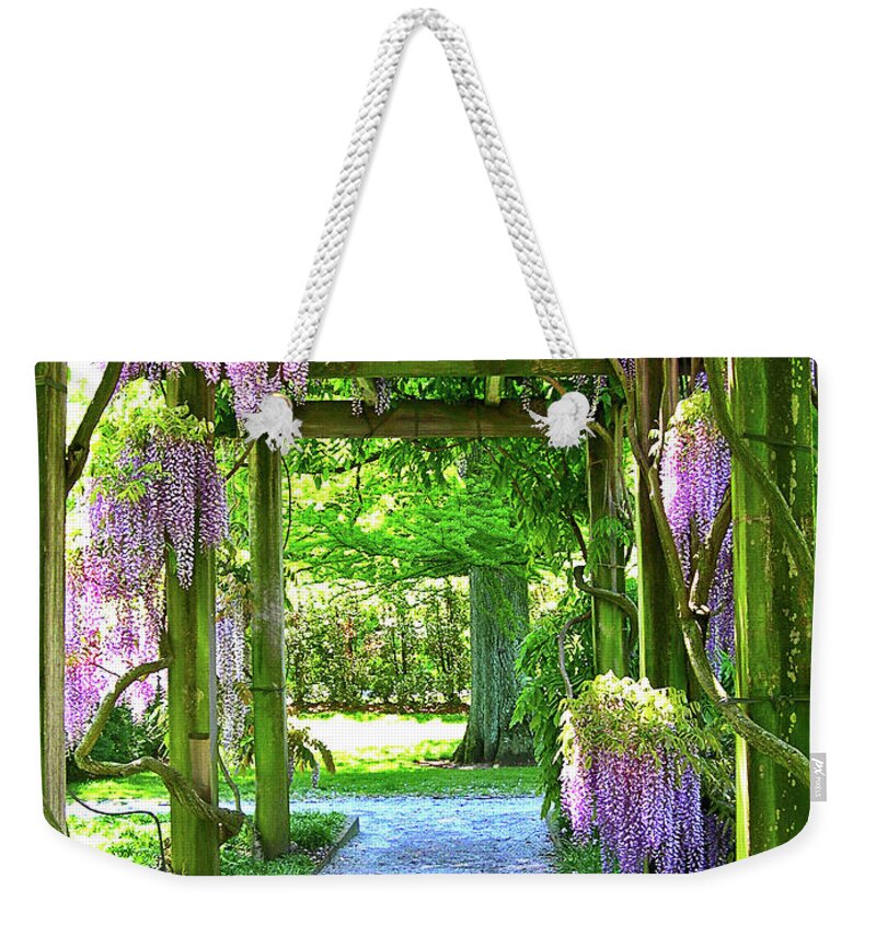 Purple Wisteria Racemes Weekender Tote Bag featuring the photograph Entranceway to Fantasyland by Susan Maxwell Schmidt