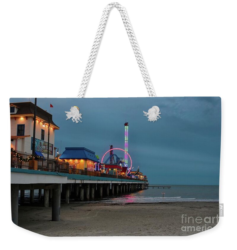 Stormy Weekender Tote Bag featuring the photograph Evening Lights on the Pleasure Pier by Diana Mary Sharpton