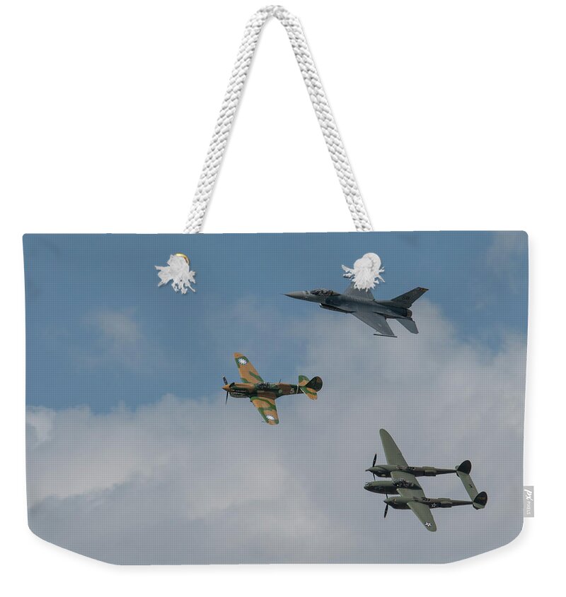 Aviation Weekender Tote Bag featuring the photograph F16 P40 and P38 Formation Flight by Carolyn Hutchins