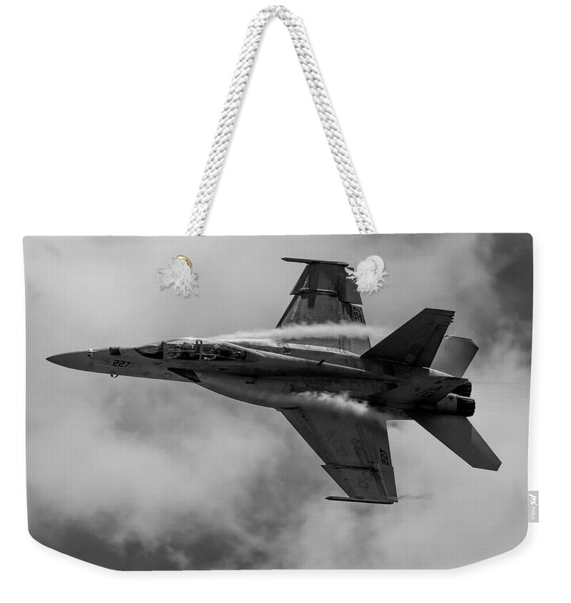 Airplane Weekender Tote Bag featuring the photograph F18 in Black and White by Carolyn Hutchins