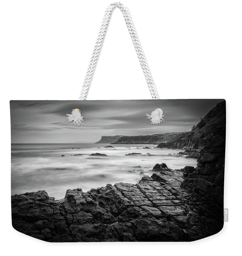 Fairhead Weekender Tote Bag featuring the photograph Fairhead from Ballycastle by Nigel R Bell