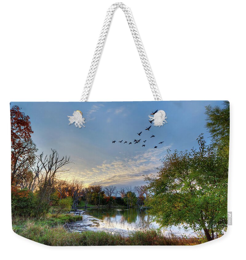 Geese Pond Autumn Fall Trees Color Horizontal Landscape Scenic Blue Green Goose Hunting Sunset Weekender Tote Bag featuring the photograph Fall Flight by Peter Herman