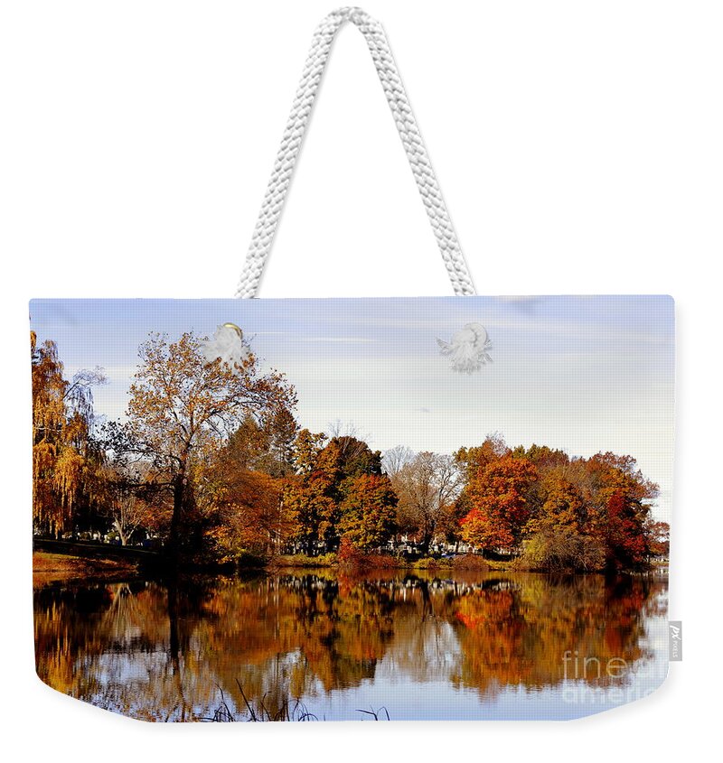  Weekender Tote Bag featuring the photograph Fall reflections on Lake Quanapowitt by Lennie Malvone