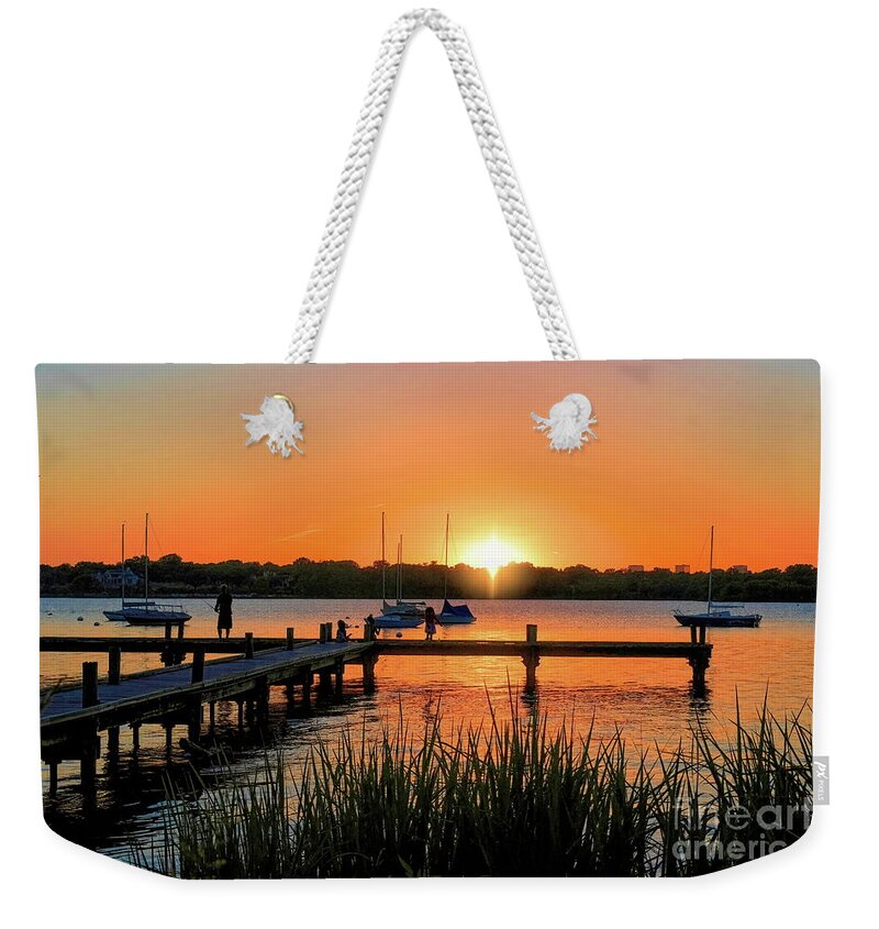 Sunset Weekender Tote Bag featuring the photograph Family Fishing at Sunset by Diana Mary Sharpton