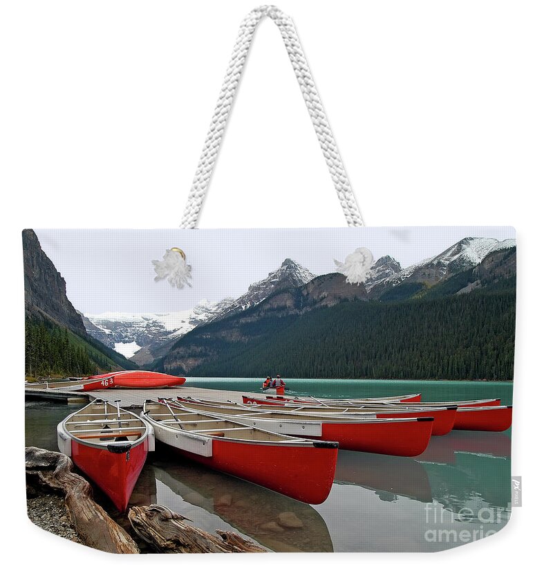 Alberta Weekender Tote Bag featuring the photograph Fan Shaped Canoes - Lake Louise Banff - Banff National Park - Alberta - Canada by Paolo Signorini