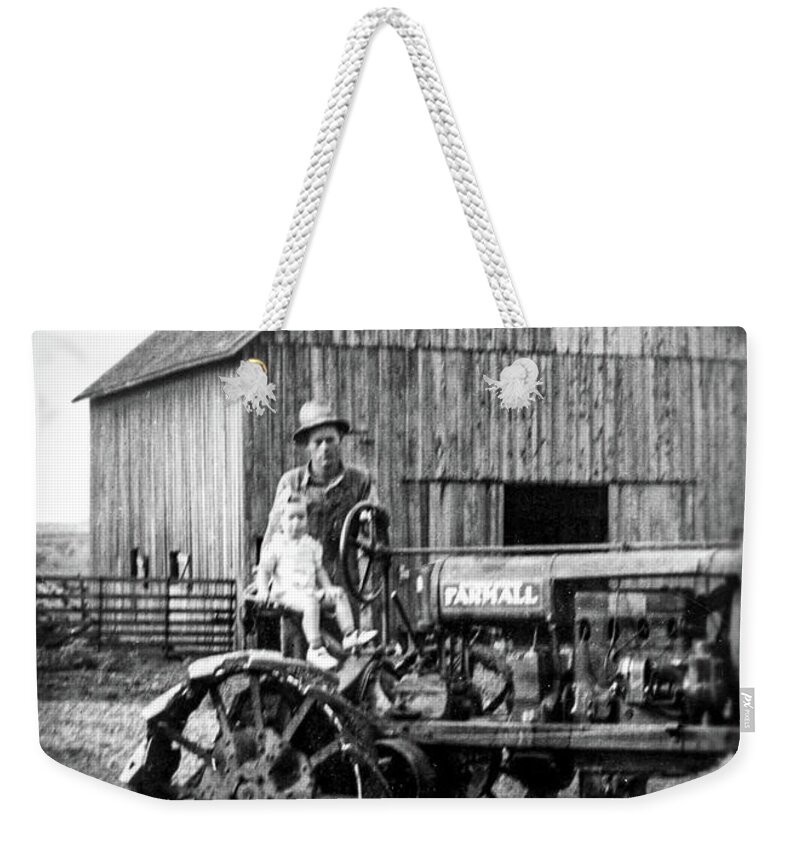 1940s Weekender Tote Bag featuring the photograph Father Daughter Farmall #1 by Unknown