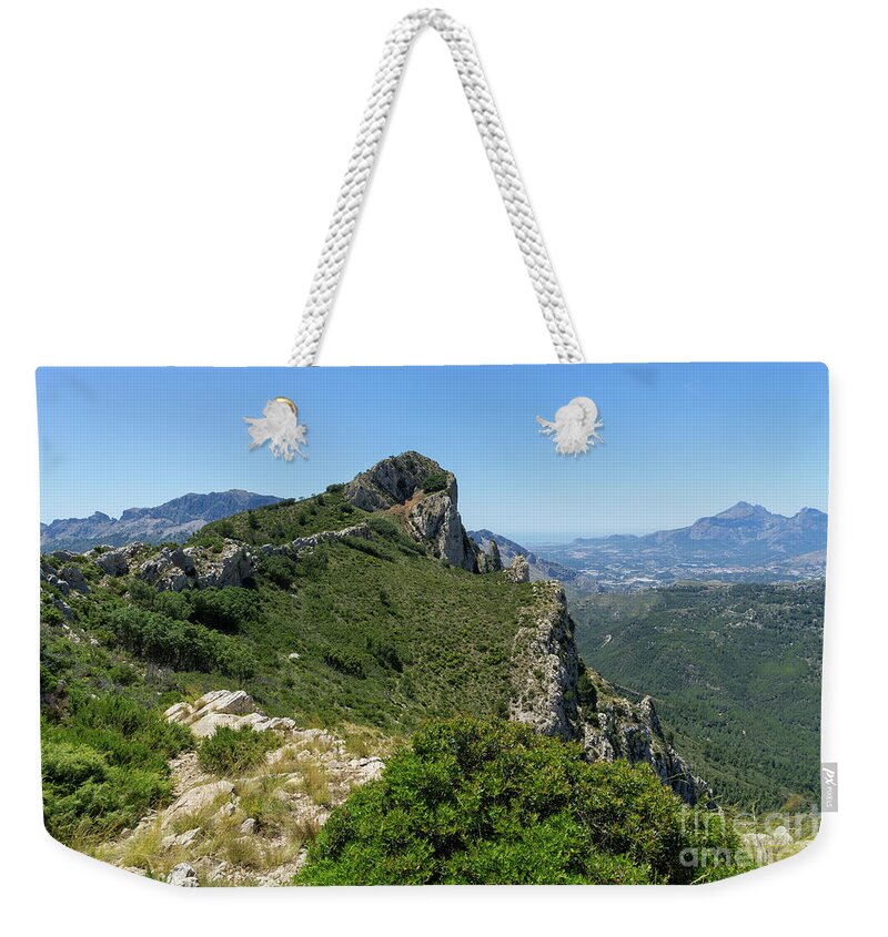 Mountain Weekender Tote Bag featuring the photograph Ferrer mountain ridge and view of Puig Campana by Adriana Mueller