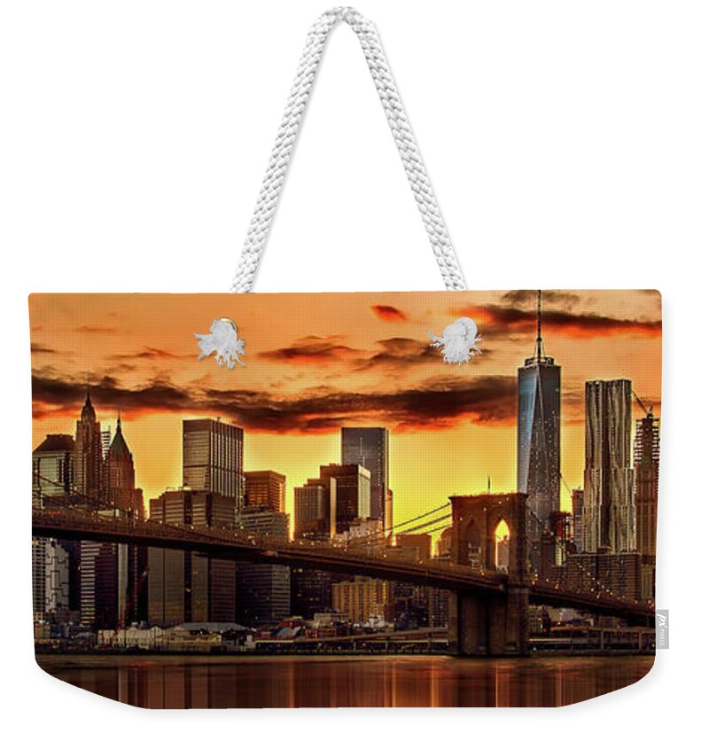 New York City Weekender Tote Bag featuring the photograph Fiery Sunset Over Manhattan by Az Jackson
