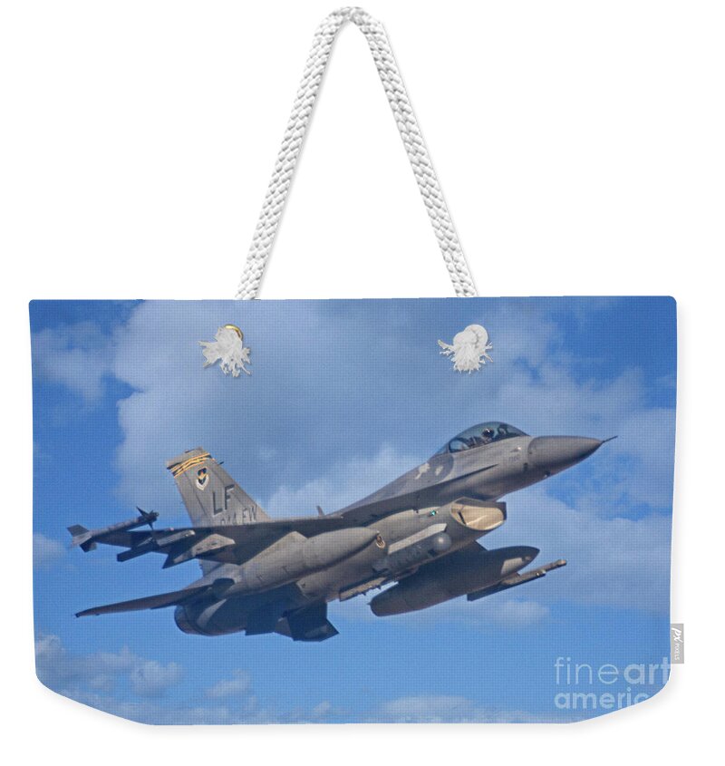 F-16 Weekender Tote Bag featuring the photograph Fighting Falcon by Bob Hislop
