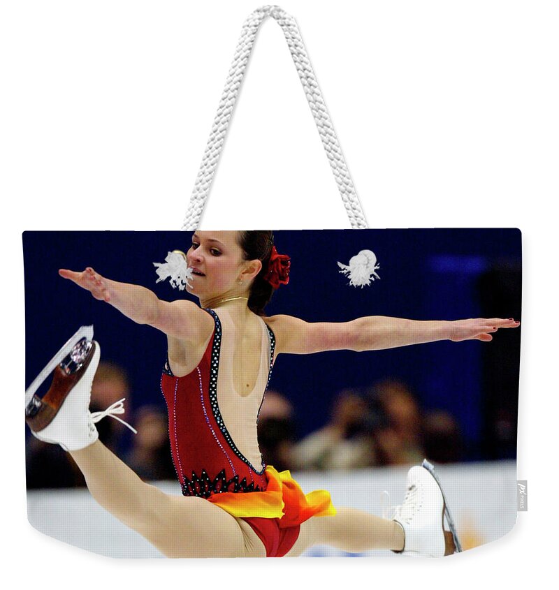 Sasha Cohen Weekender Tote Bag featuring the photograph Figure Skating Jump Sasha Cohen by Rick Wilking