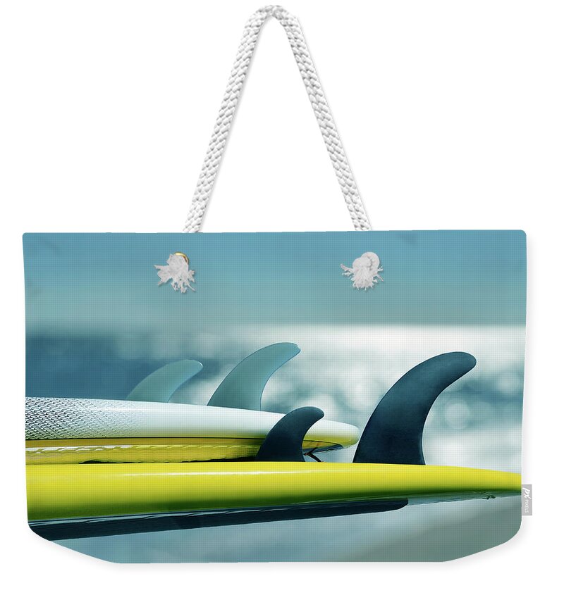 Surfer Weekender Tote Bag featuring the photograph Fins Up Surfboard Stack by Laura Fasulo