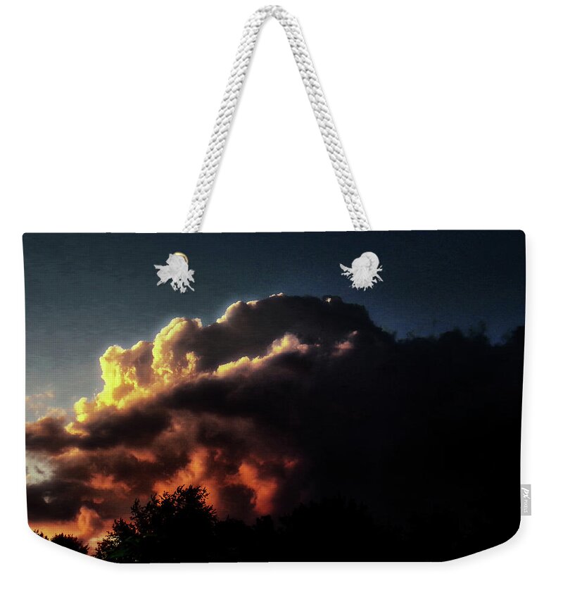 Sunset Weekender Tote Bag featuring the photograph Fire in the Sky by Christopher Reed