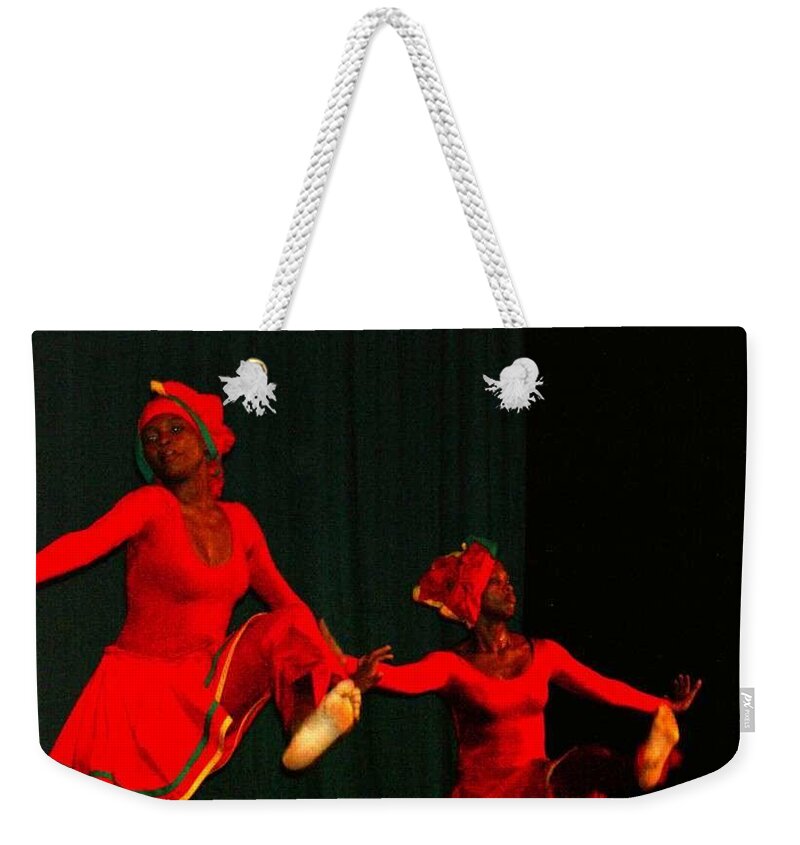 Tivoli Dance Troop Weekender Tote Bag featuring the photograph Fire Walkers by Trevor A Smith