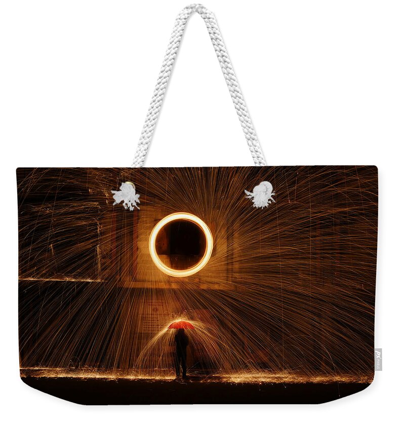 Richard Reeve Weekender Tote Bag featuring the photograph Firedrops by Richard Reeve