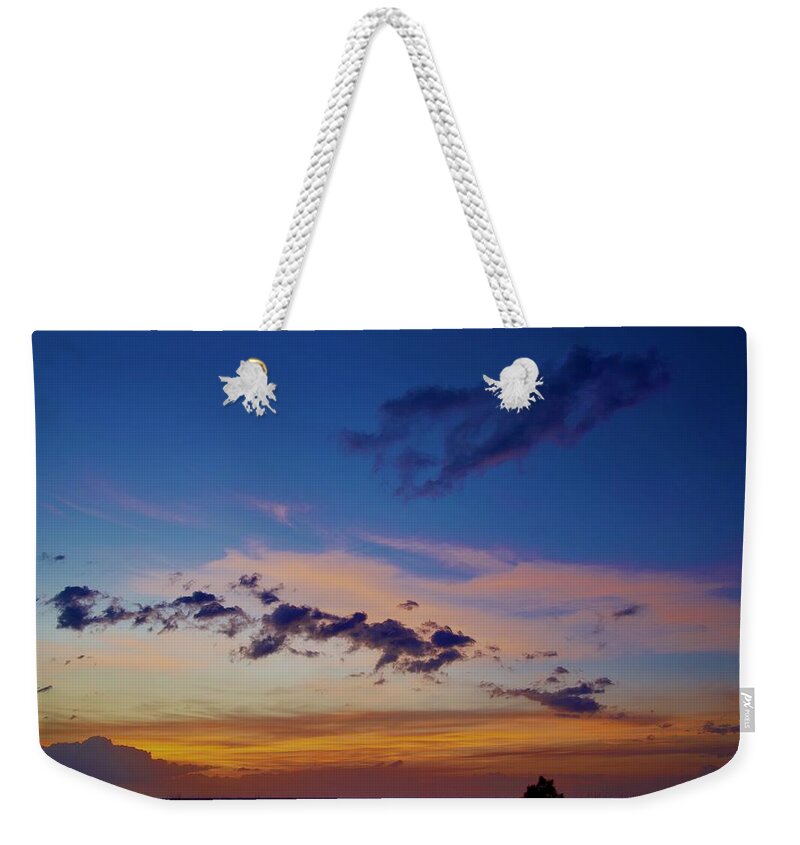 Sunrise Weekender Tote Bag featuring the photograph First Light Over The Atlantic by Dennis Schmidt
