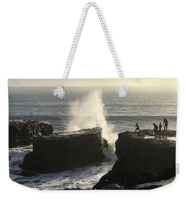 Jennifer Kane Webb Weekender Tote Bag featuring the photograph Fishing Over West Cliff by Jennifer Kane Webb