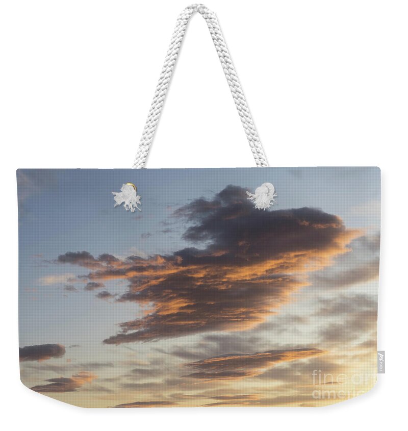 Clouds Weekender Tote Bag featuring the photograph Cloud at sunset, like a bird by Adriana Mueller