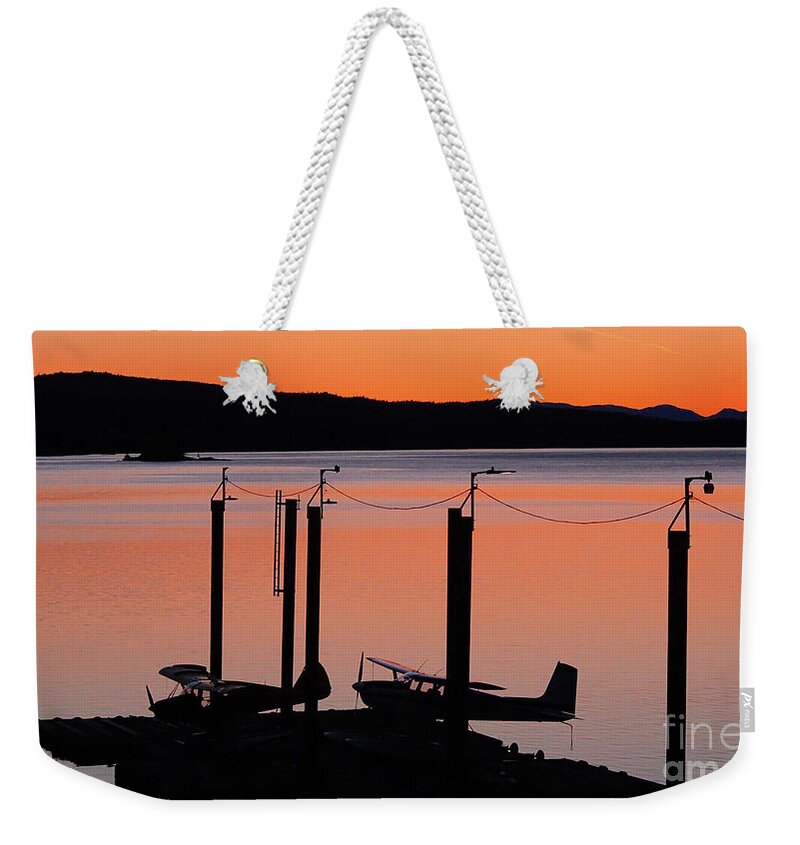 Float Weekender Tote Bag featuring the photograph Float plane sunset by Steve Speights