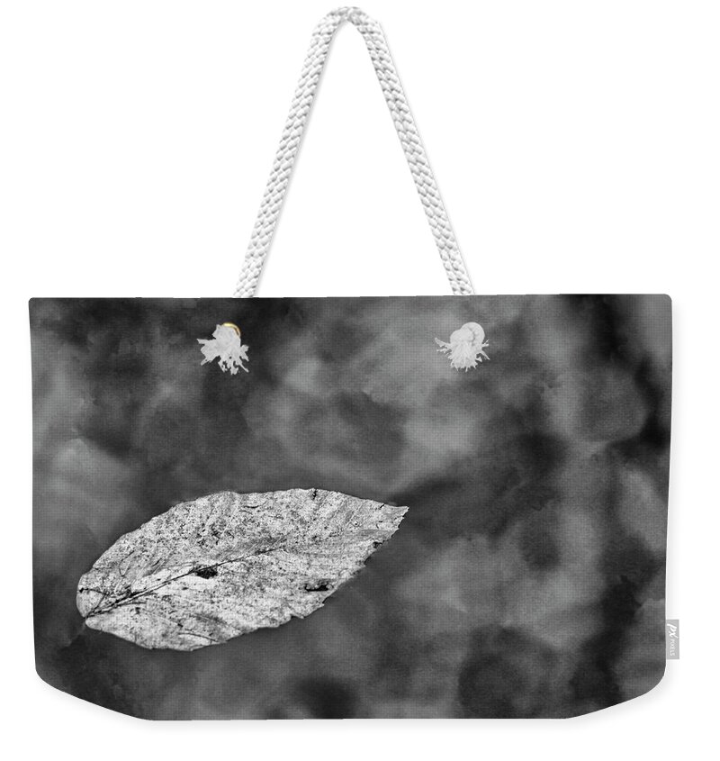 Leaf Weekender Tote Bag featuring the photograph Floating Leaf in Black and White by Bob Decker