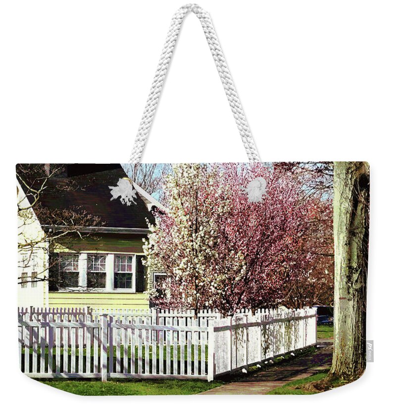 Spring Weekender Tote Bag featuring the photograph Flowering Trees in Spring by Susan Savad