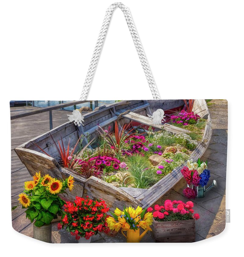 Boats Weekender Tote Bag featuring the photograph Flowers in a Rowboat by Debra and Dave Vanderlaan