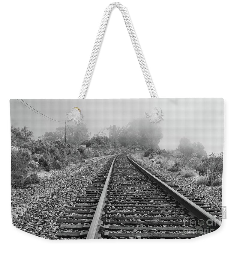 Fog Weekender Tote Bag featuring the photograph Fog on the Tracks by Jeff Hubbard
