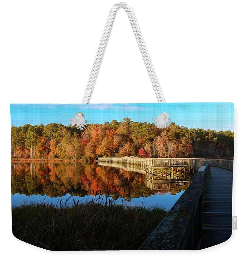 Autumn Weekender Tote Bag featuring the photograph Footbridge to Autumn Splendor in Newport News Park by Ola Allen